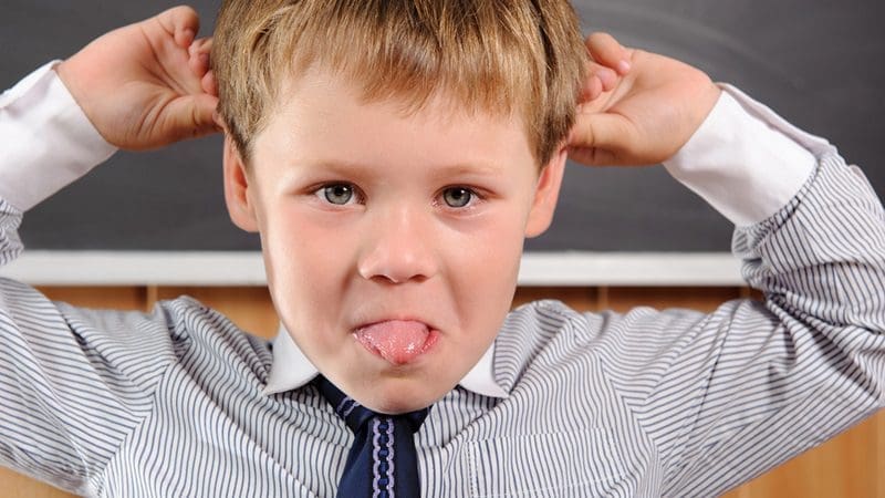 Funny preschool aged boy fooling in classroom; Shutterstock ID 109983830; PO: TODAY.com