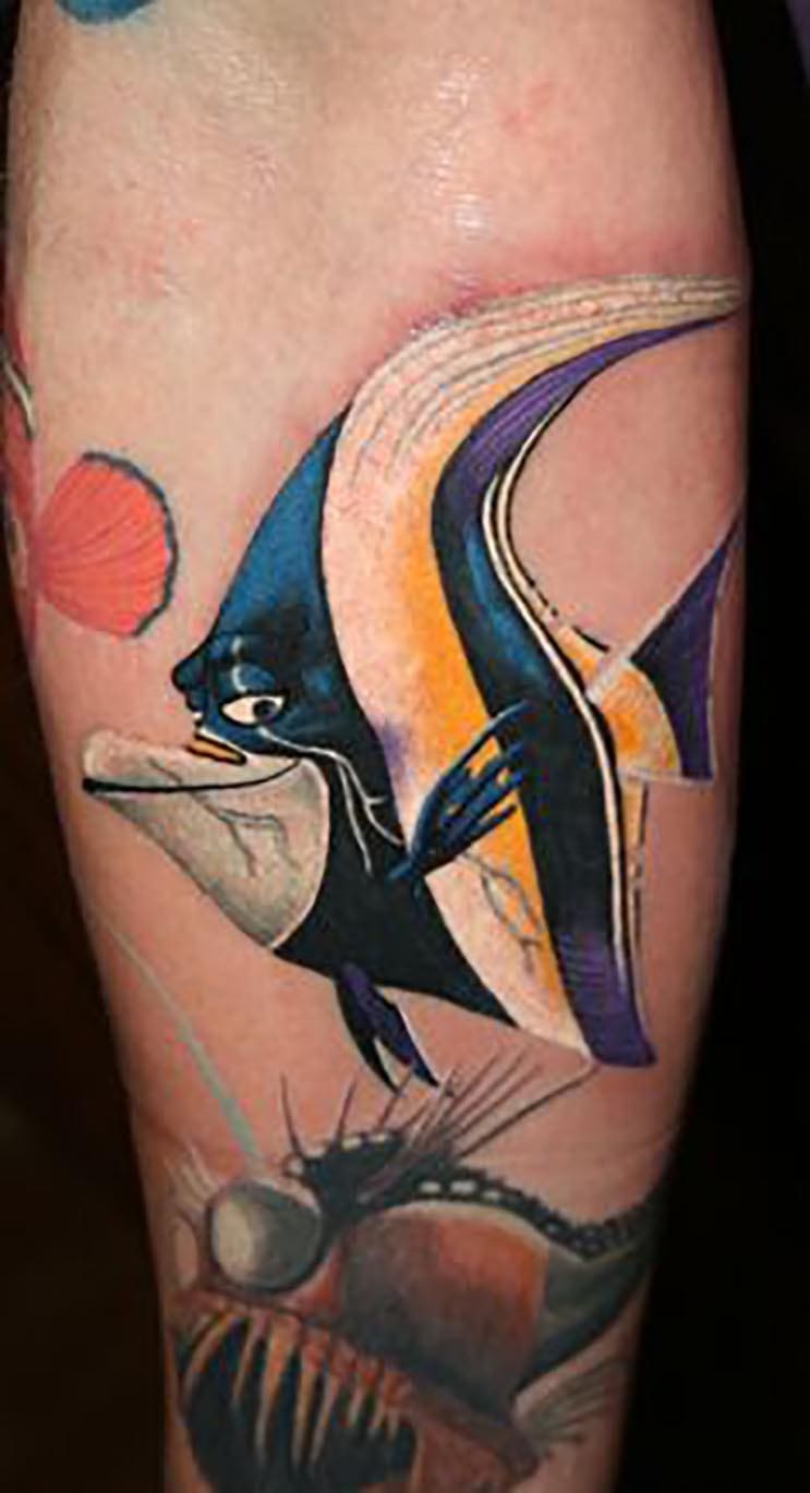 Increíbles tatuajes inspirados en las películas de Pixar 2